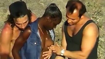 A Dark-Haired Woman Was Plowed By Two White Men At The Beach.