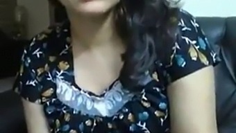 A Native Of India, With Big Boobs And A Lot Of Bosoms Doing Video Chat.