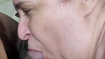 Middle-Aged Woman Gives A Young Delivery Man A Sensual Blowjob