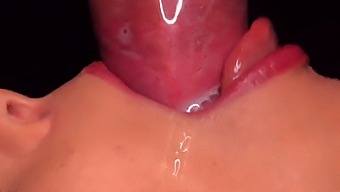 Intense Close-Up Of Milking Cum From Condom Into Mouth