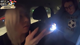 Kira Viburn And Emma Korti Give Each Other Oral Pleasure In A Car While Being Watched By Traffic Police